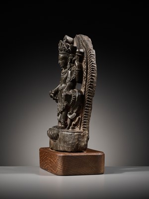 Lot 183 - A LIMESTONE STELE OF VISHNU, LATE MALLA, THREE KINGDOMS PERIOD