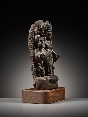 Lot 183 - A LIMESTONE STELE OF VISHNU, LATE MALLA, THREE KINGDOMS PERIOD