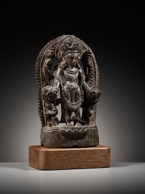 Lot 183 - A LIMESTONE STELE OF VISHNU, LATE MALLA, THREE KINGDOMS PERIOD