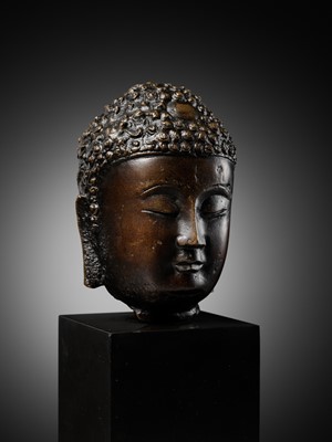 Lot 653 - A LARGE BRONZE HEAD OF BUDDHA, YUAN - EARLY MING DYNASTY, CHINA, 14TH-15TH CENTURY