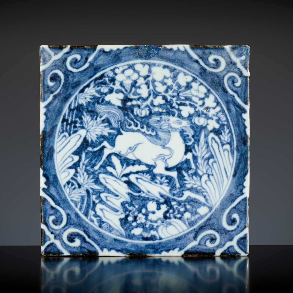 Lot 484 - A BLUE AND WHITE ‘QILIN’ TILE, LATE MING DYNASTY