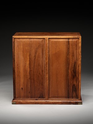 Lot 18 - A LARGE HUANGHUALI APOTHECARY CABINET (YAOGUI) WITH FOURTEEN DRAWERS, EARLY QING DYNASTY
