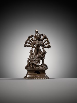 Lot 204 - A SMALL BRONZE FIGURE OF DURGA SLAYING THE BUFFALO-DEMON MAHISHA, INDIA, 16TH-17TH CENTURY