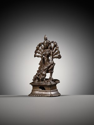 Lot 204 - A SMALL BRONZE FIGURE OF DURGA SLAYING THE BUFFALO-DEMON MAHISHA, INDIA, 16TH-17TH CENTURY