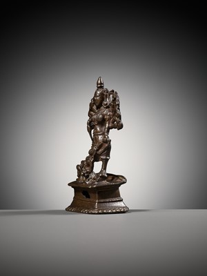 Lot 204 - A SMALL BRONZE FIGURE OF DURGA SLAYING THE BUFFALO-DEMON MAHISHA, INDIA, 16TH-17TH CENTURY