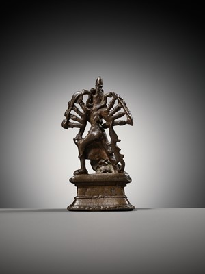 Lot 204 - A SMALL BRONZE FIGURE OF DURGA SLAYING THE BUFFALO-DEMON MAHISHA, INDIA, 16TH-17TH CENTURY