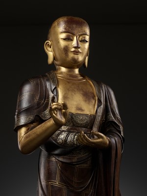 Lot 187 - A LARGE AND HIGHLY IMPORTANT ZITAN AND GILT-LACQUERED STATUE OF SARIPUTRA, THE FIRST OF BUDDHA'S TWO CHIEF DISCIPLES, CHINA, 1520-1580