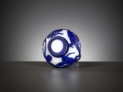 Lot 23 - A SAPPHIRE-BLUE OVERLAY GLASS ‘CHILONG’ BOTTLE VASE, QIANLONG MARK AND POSSIBLY OF THE PERIOD
