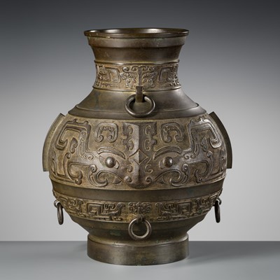 Lot 337 - A BRONZE ARCHAISTIC ‘TAOTIE’ VASE, HU, EARLY QING DYNASTY