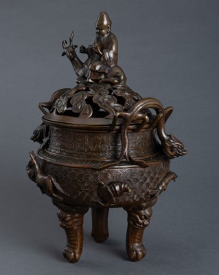 Lot 1016 - A LARGE BRONZE ‘SHOULAO AND DEER’ TRIPOD CENSER AND COVER, 19TH CENTURY