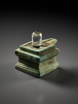 Lot 358 - A ROCK CRYSTAL LINGA AND BRONZE YONI, ANGKOR PERIOD
