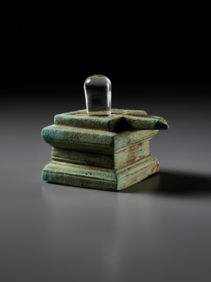 Lot 358 - A ROCK CRYSTAL LINGA AND BRONZE YONI, ANGKOR PERIOD
