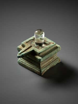 Lot 358 - A ROCK CRYSTAL LINGA AND BRONZE YONI, ANGKOR PERIOD