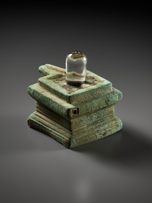 Lot 358 - A ROCK CRYSTAL LINGA AND BRONZE YONI, ANGKOR PERIOD
