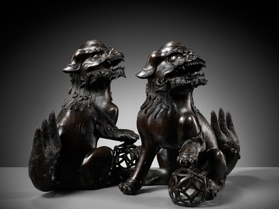 Lot 79 - A PAIR OF LARGE BRONZE ‘BUDDHIST LION’ CENSERS, 17TH CENTURY