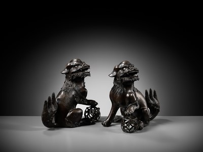 Lot 79 - A PAIR OF LARGE BRONZE ‘BUDDHIST LION’ CENSERS, 17TH CENTURY