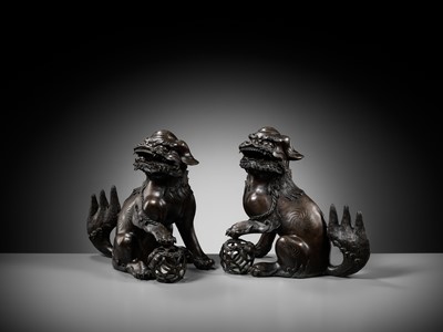 Lot 79 - A PAIR OF LARGE BRONZE ‘BUDDHIST LION’ CENSERS, 17TH CENTURY