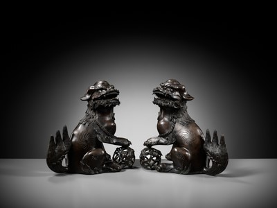 Lot 79 - A PAIR OF LARGE BRONZE ‘BUDDHIST LION’ CENSERS, 17TH CENTURY