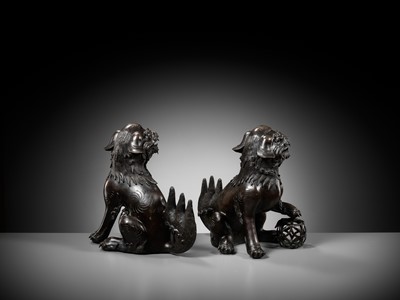 Lot 79 - A PAIR OF LARGE BRONZE ‘BUDDHIST LION’ CENSERS, 17TH CENTURY