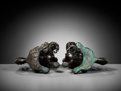 Lot 79 - A PAIR OF LARGE BRONZE ‘BUDDHIST LION’ CENSERS, 17TH CENTURY