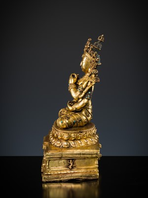 Lot 681 - A GILT BRONZE FIGURE OF PRAJNAPARAMITA, TIBET, LATE 19TH TO MID-20TH CENTURY