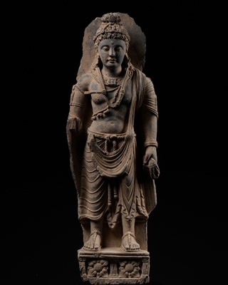 Lot 1251 - A MONUMENTAL GRAY SCHIST FIGURE OF MAITREYA