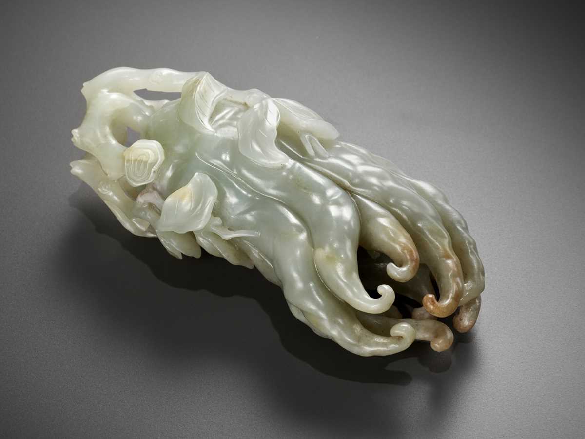 Lot 42 - A CELADON JADE CARVING OF A FINGER CITRON, CHINA, 18TH - 19TH CENTURY