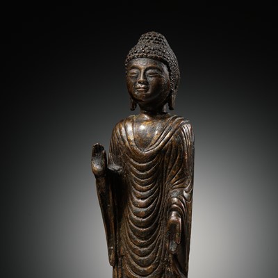 Lot 206 - A GILT-BRONZE STANDING FIGURE OF BUDDHA, UNIFIED SILLA DYNASTY, KOREA, 8TH - 9TH CENTURY