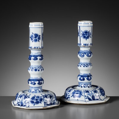Lot 151 - A PAIR OF BLUE AND WHITE CANDLESTICKS, KANGXI PERIOD