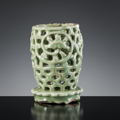 A LONGQUAN CELADON RETICULATED CANDLE HOLDER, MING DYNASTY