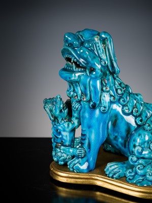 Lot 492 - A PAIR OF TURQUOISE-GLAZED FIGURES OF BUDDHIST LIONS, KANGXI PERIOD