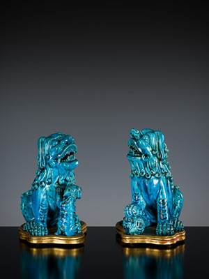 Lot 492 - A PAIR OF TURQUOISE-GLAZED FIGURES OF BUDDHIST LIONS, KANGXI PERIOD