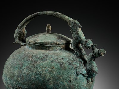 Lot 101 - A BRONZE TRIPOD RITUAL VESSEL AND COVER, HE, LATE WARRING STATES TO WESTERN HAN PERIOD