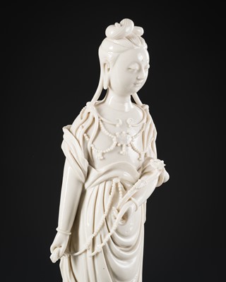 Lot 567 - A FINE DEHUA PORCELAIN FIGURE OF GUANYIN, HE CHAOZONG MARK, QING DYNASTY