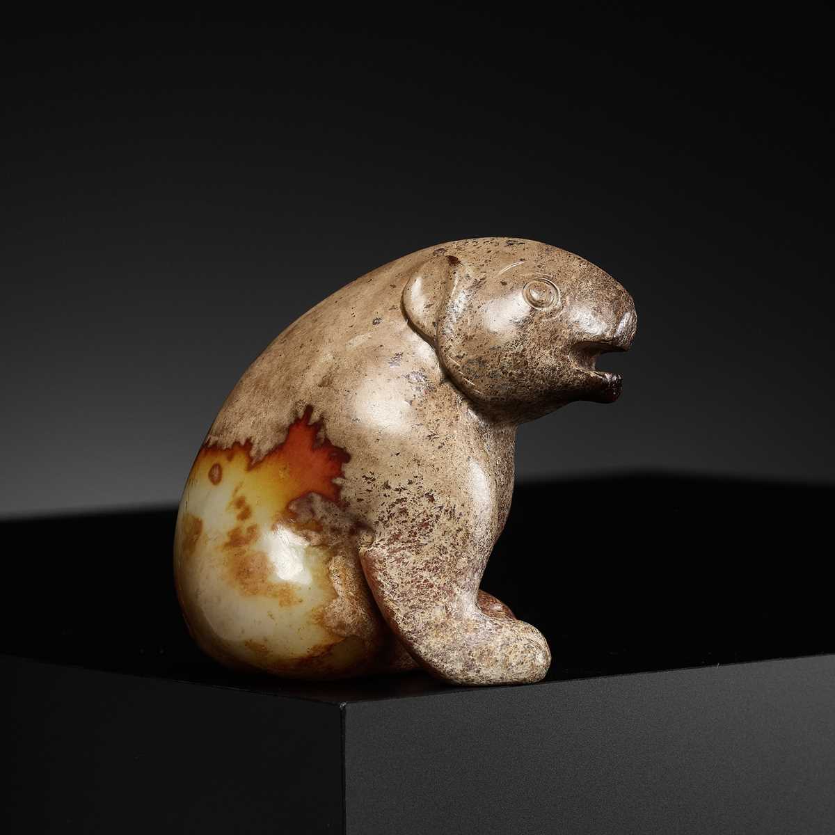 Lot 22 - AN EXCEPTIONAL YELLOW JADE FIGURE OF A BEAR, HUANGXIONG, HAN DYNASTY, CHINA, 202 BC – 220 AD