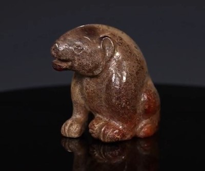 Lot 22 - AN EXCEPTIONAL YELLOW JADE FIGURE OF A BEAR, HUANGXIONG, HAN DYNASTY, CHINA, 202 BC – 220 AD