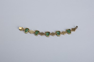 A GROUP OF FINE JADEITE, 18K GOLD, AND GILT SILVER JEWELRY, c. 1920s