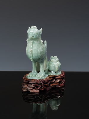 Lot 351 - AN ARCHAISTIC JADEITE ‘MYTHICAL BIRD’ GROUP OF TWO VESSELS AND COVERS, LATE QING DYNASTY TO REPUBLIC PERIOD