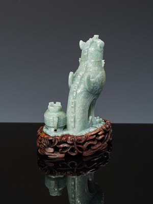Lot 351 - AN ARCHAISTIC JADEITE ‘MYTHICAL BIRD’ GROUP OF TWO VESSELS AND COVERS, LATE QING DYNASTY TO REPUBLIC PERIOD