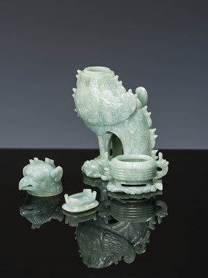 Lot 351 - AN ARCHAISTIC JADEITE ‘MYTHICAL BIRD’ GROUP OF TWO VESSELS AND COVERS, LATE QING DYNASTY TO REPUBLIC PERIOD