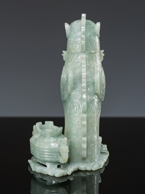Lot 351 - AN ARCHAISTIC JADEITE ‘MYTHICAL BIRD’ GROUP OF TWO VESSELS AND COVERS, LATE QING DYNASTY TO REPUBLIC PERIOD