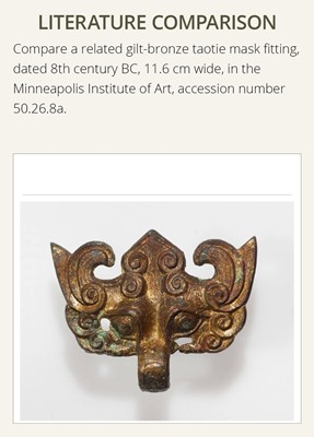 Lot 70 - A MASSIVE GILT-BRONZE TAOTIE MASK FITTING WITH RING HOOK, PUSHOU, HAN DYNASTY