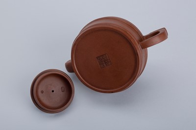A SIGNED YIXING ZISHA TEAPOT AND COVER