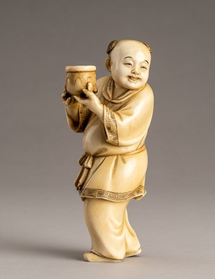 Lot 584 - A FINE IVORY OKIMONO OF A KARAKO (CHINESE BOY), MEIJI