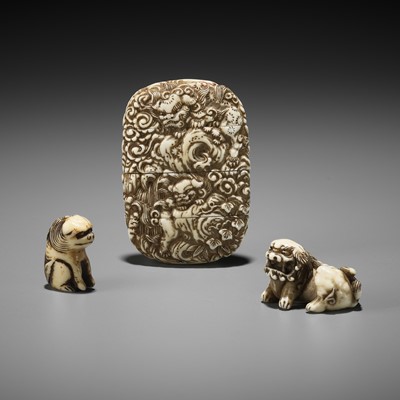 Lot 349 - A RARE MINIATURE IVORY SAGEMONO SET DEPICTING SHISHI AMONG PEONY, WITH EN SUITE NETSUKE AND OJIME