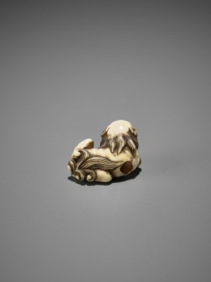 Lot 349 - A RARE MINIATURE IVORY SAGEMONO SET DEPICTING SHISHI AMONG PEONY, WITH EN SUITE NETSUKE AND OJIME