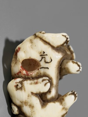 Lot 349 - A RARE MINIATURE IVORY SAGEMONO SET DEPICTING SHISHI AMONG PEONY, WITH EN SUITE NETSUKE AND OJIME