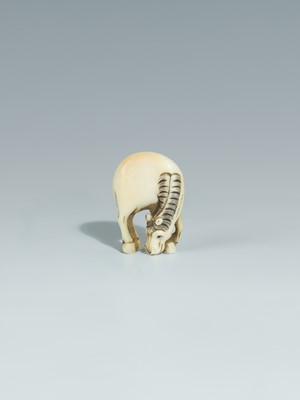Lot 394 - TWO IVORY NETSUKE DEPICTING A GRAZING HORSE AND A RAT ON A CANDLE