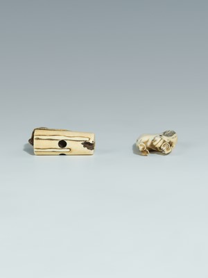 Lot 394 - TWO IVORY NETSUKE DEPICTING A GRAZING HORSE AND A RAT ON A CANDLE