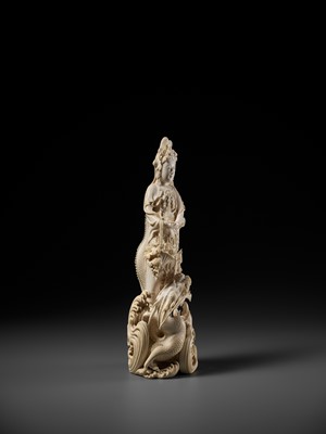 Lot 146 - RYUMIN: AN IMPRESSIVE TOKYO SCHOOL IVORY OKIMONO OF SHO-KANNON WITH DRAGON